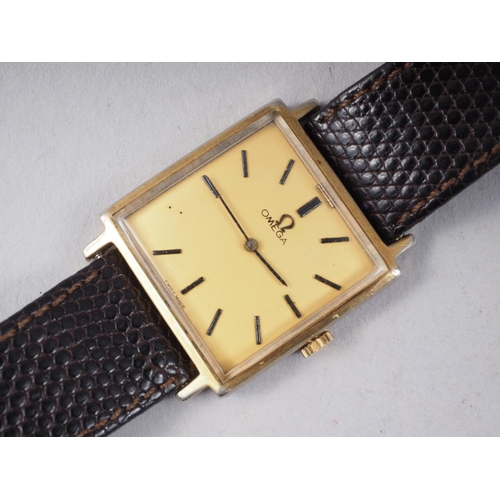 288 - An Omega rolled gold cased wristwatch with later Gucci strap