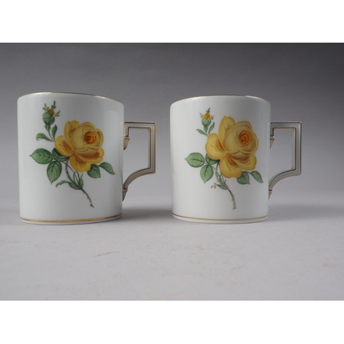 3 - A pair of Meissen mugs, decorated with yellow roses, 3 1/2