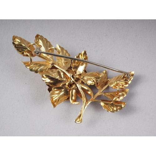 306 - An 18ct gold rose brooch, 16g