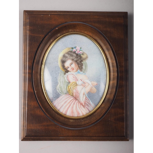 323 - A portrait miniature on ivory of a girl with doves, 4 1/2