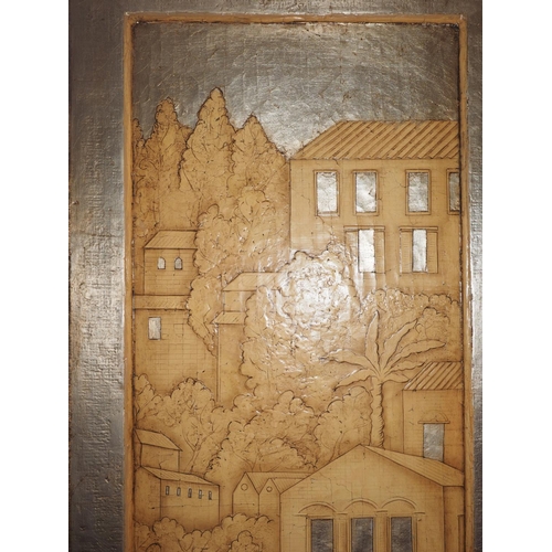 406 - A pair of hand-painted and silvered applique panels, townscapes, 69