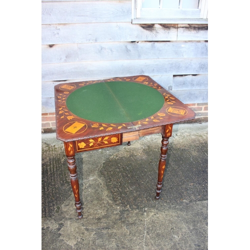 418 - A walnut and floral marquetry card table, on turned supports, 33