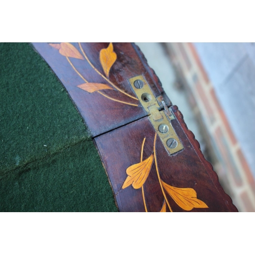 418 - A walnut and floral marquetry card table, on turned supports, 33