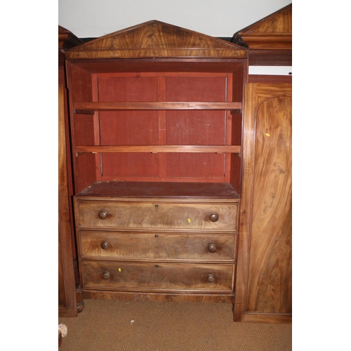 421 - An early 19th century figured mahogany double sentry box wardrobe, the centre section fitted slides ... 