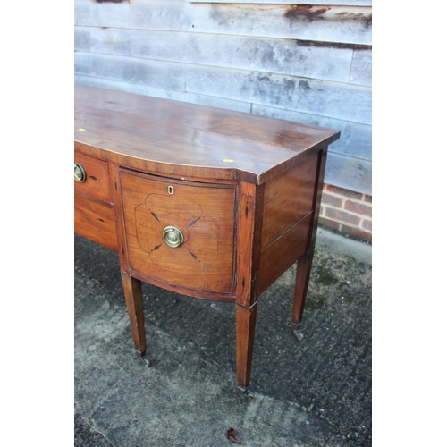 427 - A 19th century mahogany break bowfront sideboard, fitted two central drawers flanked cupboards, on s... 