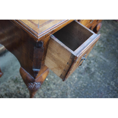 429 - An 18th century design walnut and banded lowboy, fitted one long drawer and two short drawers, on sh... 