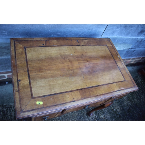 429 - An 18th century design walnut and banded lowboy, fitted one long drawer and two short drawers, on sh... 