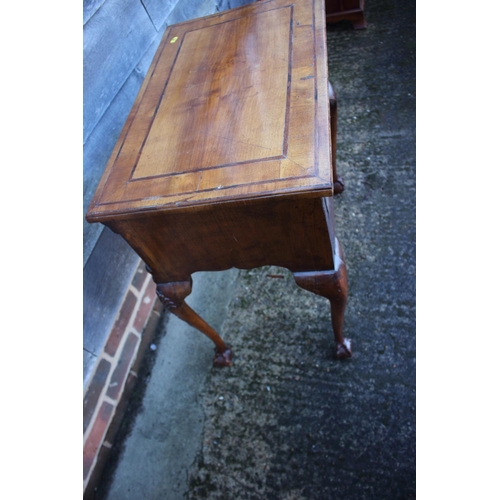 429 - An 18th century design walnut and banded lowboy, fitted one long drawer and two short drawers, on sh... 