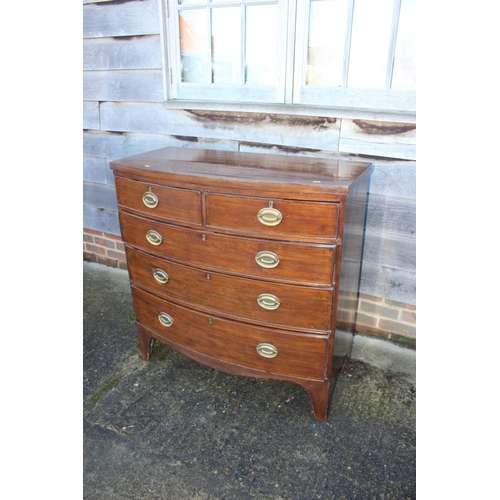 430 - A 19th century mahogany and banded bowfront chest of two short and three long graduated drawers with... 