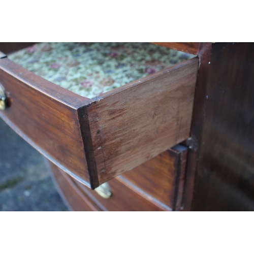 430 - A 19th century mahogany and banded bowfront chest of two short and three long graduated drawers with... 