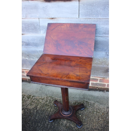 431 - A 19th century figured walnut flap top work table, on octagonal tapered column and quadruple support... 