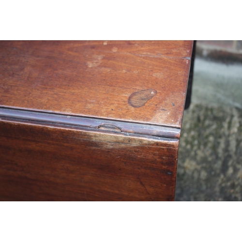 433 - A late Georgian mahogany drop leaf dining table, on moulded and chamfered supports, 48