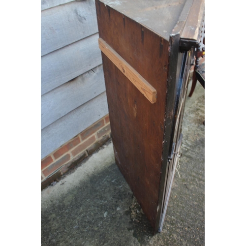 434 - An 18th century oak corner hanging cupboard, fitted shaped shelves enclosed arch top panel door, 33