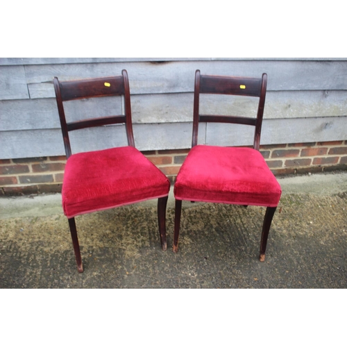 440 - A pair of 19th century mahogany bar back standard dining chairs, upholstered in a crimson Draylon, o... 