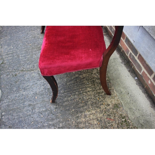 440 - A pair of 19th century mahogany bar back standard dining chairs, upholstered in a crimson Draylon, o... 