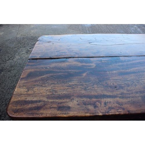 449 - An antique elm slab top refectory table, on chamfered and stretchered supports, top 84