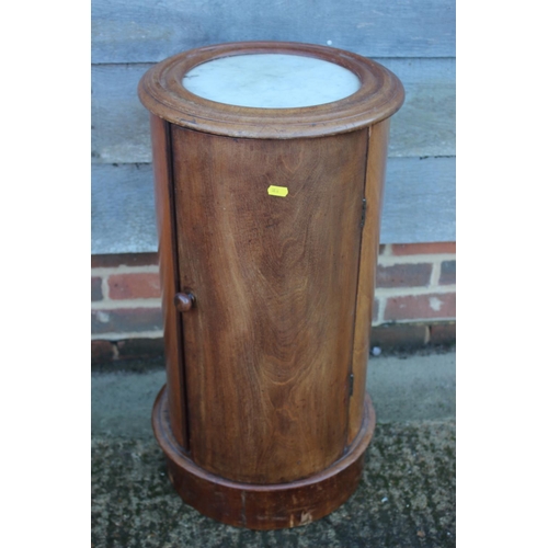 455 - A late 19th century mahogany and marble top cylindrical bedside cupboard enclosed one door, 15