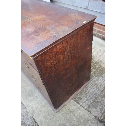 459 - An early Georgian oak and banded chest on chest, the upper section fitted two small and three long g... 