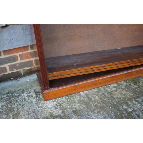 461 - A 19th century walnut open bookcase, fitted adjustable shelves, on block base, 48