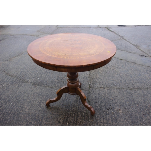 463 - A 19th century Italian walnut and marquetry circular top occasional table with St George and the dra... 