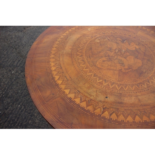 463 - A 19th century Italian walnut and marquetry circular top occasional table with St George and the dra... 