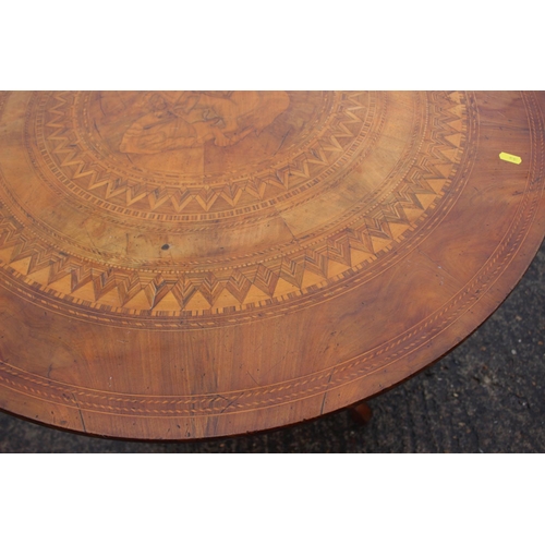 463 - A 19th century Italian walnut and marquetry circular top occasional table with St George and the dra... 