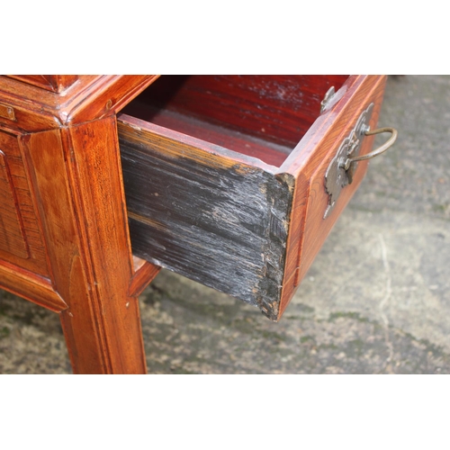 468 - An antique Chinese and hardwood seat with lattice decorated sides and back over four drawers, on sha... 