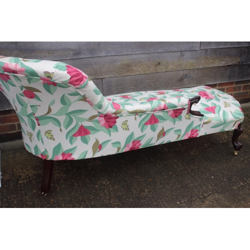 473 - A late 19th century serpentine shaped back chaise longue, button upholstered in a floral linen, on c... 