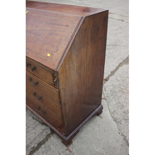 475 - A George III mahogany box and ebony strung fall front bureau, the interior fitted drawers and pigeon... 