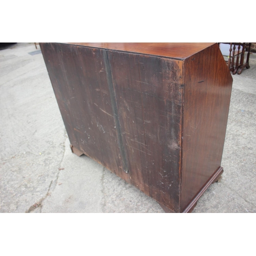 475 - A George III mahogany box and ebony strung fall front bureau, the interior fitted drawers and pigeon... 