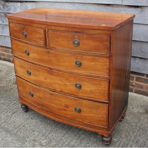 478 - A late 19th century mahogany bowfront chest of two short and three long graduated drawers, on turned... 