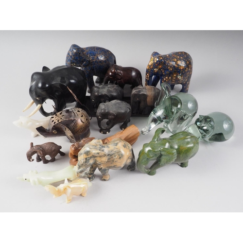 48 - A quantity of model elephants and carved hardstone model animals