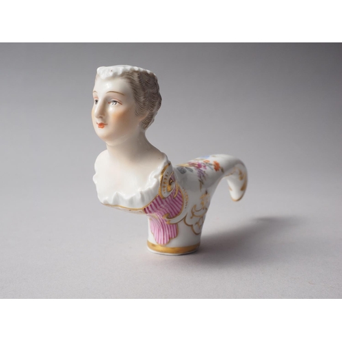 5 - A German porcelain cane handle formed as the bust of a female, 4 3/4