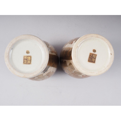 81 - A pair of Satsuma figure decorated oviform vases with signature marks to base, 7