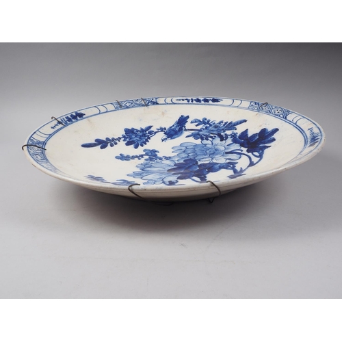 89 - A Japanese blue and white bird decorated charger, 19