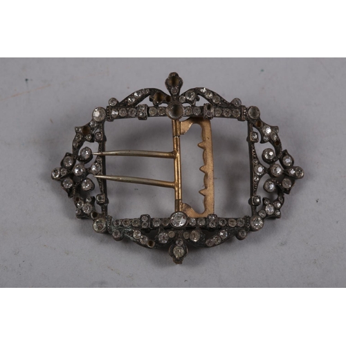 303 - A late 18th century paste set gilt metal buckle, 3 1/2