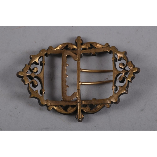 303 - A late 18th century paste set gilt metal buckle, 3 1/2