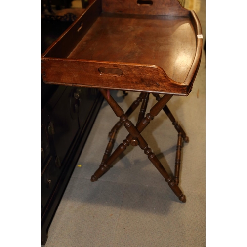 422 - A butler's 19th century mahogany bowfront tray, on folding stand, 32