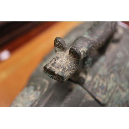 115 - A Chinese bronze limited edition ritual vessel, formed as a water buffalo with engraved archaic deco... 