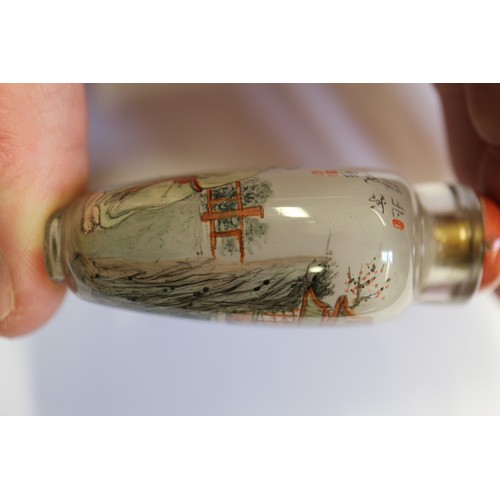 109 - A Chinese internal painted snuff bottle with coral stopper, 2 3/8