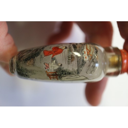 109 - A Chinese internal painted snuff bottle with coral stopper, 2 3/8