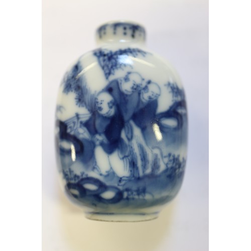 109 - A Chinese internal painted snuff bottle with coral stopper, 2 3/8