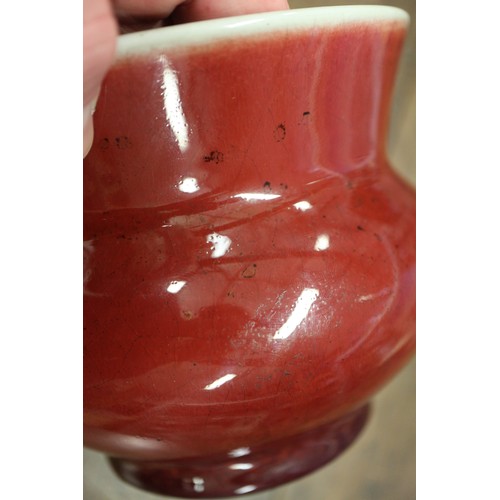 78 - A sang de boeuf vase with flared rim, 4 1/4