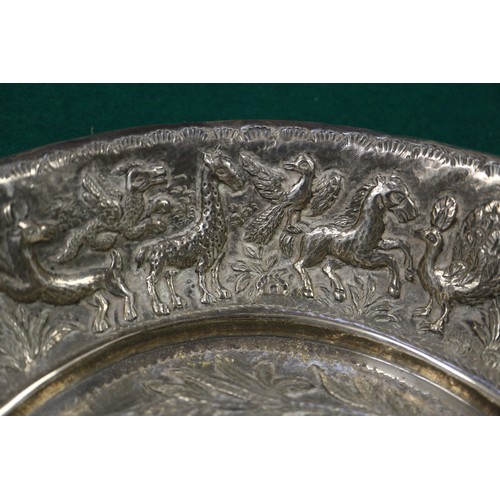 273 - A white metal dish, embossed animals, a white metal cup, a white metal beaker and five white metal a... 