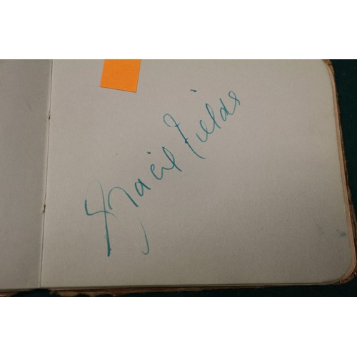 211 - An autograph book, reputedly containing autographs from Max Miller, Mary Ellis, Arthur Askey and man... 