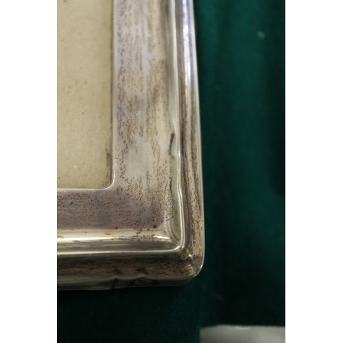 253 - Three silver mounted photograph frames