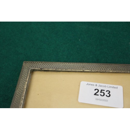 253 - Three silver mounted photograph frames