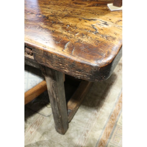 449 - An antique elm slab top refectory table, on chamfered and stretchered supports, top 84