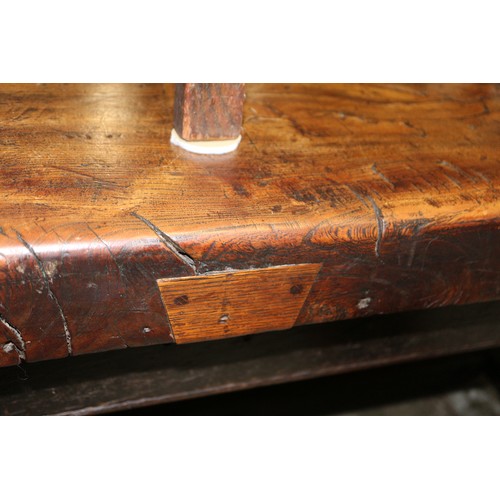 449 - An antique elm slab top refectory table, on chamfered and stretchered supports, top 84