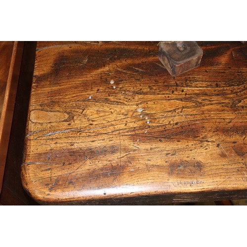 449 - An antique elm slab top refectory table, on chamfered and stretchered supports, top 84